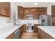 Well-equipped kitchen featuring stainless appliances, wood cabinets, and a bright, clean design at 951 E Jacob St, Chandler, AZ 85225