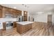 Kitchen merges with the living room with stainless appliances and central island at 951 E Jacob St, Chandler, AZ 85225