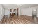 Bright living room featuring wood flooring and an open layout with kitchen view at 951 E Jacob St, Chandler, AZ 85225