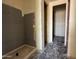 Under-construction bathroom with shower features drywall and awaits finishing touches at 9540 W Parkway Dr, Tolleson, AZ 85353