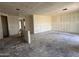 Bright living room under construction features drywall and an open layout, ready for personalization at 9540 W Parkway Dr, Tolleson, AZ 85353