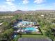 Expansive aerial view of community pool and surrounding homes, showcasing the community's amenities and location at 12062 W Duane Ln, Peoria, AZ 85383