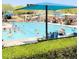 Enjoy the pool on a hot summer day with friends and Gathering at this community pool with chairs and umbrellas at 12062 W Duane Ln, Peoria, AZ 85383