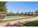 Community pickleball courts with shade structures for players to enjoy a game on a sunny day at 12062 W Duane Ln, Peoria, AZ 85383