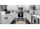 Bright kitchen features white cabinetry, stainless steel appliances, and modern countertops at 15252 N 100Th St # 1154, Scottsdale, AZ 85260