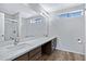 Bathroom features double sinks, modern fixtures, and a glass enclosed shower at 2035 E Escuda Rd, Phoenix, AZ 85024
