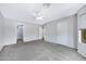 Spacious bedroom with carpet, ceiling fan, and neutral paint, ready for personalization at 2035 E Escuda Rd, Phoenix, AZ 85024