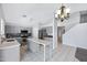 Stylish kitchen featuring gray cabinets, stainless steel appliances, and a functional center island at 2035 E Escuda Rd, Phoenix, AZ 85024