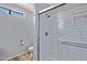 Modern shower with sleek fixtures and white subway tile, creating a clean aesthetic at 2035 E Escuda Rd, Phoenix, AZ 85024