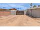 Expansive backyard featuring secure fencing and potential for creative landscaping and outdoor activities at 3212 N 49Th Ln, Phoenix, AZ 85031