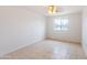 Inviting bedroom featuring a sunlit window and neutral tones, ready for your personal touch at 3212 N 49Th Ln, Phoenix, AZ 85031