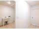 Functional laundry area featuring essential hookups and additional storage space at 3212 N 49Th Ln, Phoenix, AZ 85031