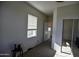 Spacious carpeted bedroom with a closet featuring mirrored doors and ample natural light at 34940 N 30Th Ave, Phoenix, AZ 85086