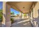 This is a shot of the back patio with a view of the pool and the golf course at 43324 W Desert Fairways Dr, Maricopa, AZ 85138