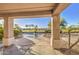 Covered back patio, pool, and great views of the golf course at 43324 W Desert Fairways Dr, Maricopa, AZ 85138