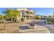 Expansive backyard featuring a fire pit, desert landscaping, and a refreshing pool, ideal for outdoor living at 43324 W Desert Fairways Dr, Maricopa, AZ 85138