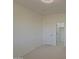 Bedroom with neutral carpet and a closet perfect for storage at 43324 W Desert Fairways Dr, Maricopa, AZ 85138