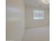Bedroom with neutral carpet and a large window for natural light at 43324 W Desert Fairways Dr, Maricopa, AZ 85138