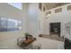 Spacious living room with a neutral color palette and natural light at 43324 W Desert Fairways Dr, Maricopa, AZ 85138