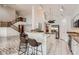 Large kitchen with granite countertops, island, and open floor plan at 514 E Vaughn Ave, Gilbert, AZ 85234
