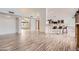 Spacious and open living room with tile floors and a combined bar and kitchen area at 514 E Vaughn Ave, Gilbert, AZ 85234