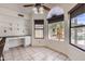 Bright home office space with built-in desk and cabinets and backyard lake view at 514 E Vaughn Ave, Gilbert, AZ 85234
