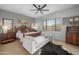Inviting bedroom with a large bed, stylish furniture, and plenty of natural light at 7145 E Cuernavaco Way, Gold Canyon, AZ 85118