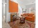 Vibrant living room featuring colorful accents, plush seating, and a well-stocked bar area, perfect for relaxation at 7145 E Cuernavaco Way, Gold Canyon, AZ 85118