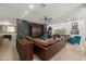 Stylish living room with bright artwork, comfortable seating, and elegant decor, creating a cozy gathering space at 7145 E Cuernavaco Way, Gold Canyon, AZ 85118