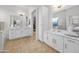 This luxurious main bathroom features double sinks, white cabinets, and ample counter space at 7145 E Cuernavaco Way, Gold Canyon, AZ 85118