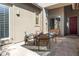 Cozy outdoor patio with seating area and stylish decor, ideal for enjoying quiet moments and casual gatherings at 7145 E Cuernavaco Way, Gold Canyon, AZ 85118