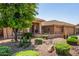 Attractive single-story home with a well-maintained desert landscaped front yard at 10903 E Ocaso Ave, Mesa, AZ 85212