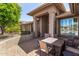 Covered patio with outdoor seating, great for relaxing and entertaining at 10903 E Ocaso Ave, Mesa, AZ 85212