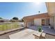 Enjoy outdoor living in this charming back patio with desert landscaping, offering privacy and relaxation at 11113 W Cameo Dr, Sun City, AZ 85351