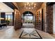 Elegant foyer featuring a decorative tile floor and access to the dining and living spaces at 11240 E Apache Vistas Dr, Scottsdale, AZ 85262