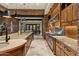 Well-appointed kitchen with stainless steel appliances, custom cabinetry, and a functional layout for culinary enthusiasts at 11240 E Apache Vistas Dr, Scottsdale, AZ 85262