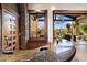 Outdoor bar area with granite countertops and views of the backyard at 11240 E Apache Vistas Dr, Scottsdale, AZ 85262
