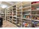 Walk-in pantry with extensive built-in shelving and storage solutions, ensuring an organized and clutter-free space at 11240 E Apache Vistas Dr, Scottsdale, AZ 85262