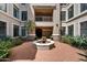 Charming courtyard with a fountain, lush landscaping, and a welcoming entrance at 11640 N Tatum Blvd # 3091, Phoenix, AZ 85028