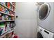 Pantry/laundry room combo with ample shelving for storage and a convenient washer/dryer setup at 11640 N Tatum Blvd # 3091, Phoenix, AZ 85028
