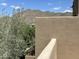 Balcony view captures the natural desert landscape and scenic mountains, creating a tranquil and private retreat at 11752 N 135Th Pl, Scottsdale, AZ 85259