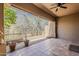 Relaxing covered patio with tile flooring and desert views at 11752 N 135Th Pl, Scottsdale, AZ 85259