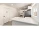 Bright kitchen featuring white cabinets, modern countertops, and stainless steel appliances at 11842 N 30Th Dr, Phoenix, AZ 85029