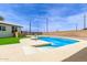 Backyard swimming pool featuring pristine blue water, and surrounding concrete surface at 11842 N 30Th Dr, Phoenix, AZ 85029