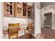 Dedicated office space featuring built in shelves and a desk for two people at 14207 W Kiowa Trl, Surprise, AZ 85374
