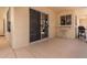 Spacious outdoor patio with sliding glass door and space for grilling and dining at 14207 W Kiowa Trl, Surprise, AZ 85374