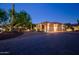 Beautiful home with a three-car garage, a desert landscape, and a patterned brick driveway at 1423 E Breezy Ct, Phoenix, AZ 85086