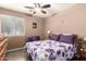 Bedroom with light-toned walls, window, and furniture at 14514 N 128Th Dr, El Mirage, AZ 85335