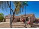 Lovely one-story home with low-maintenance landscaping and mature tree, situated on the corner of an intersection at 14514 N 128Th Dr, El Mirage, AZ 85335