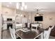 Open-concept living area with view of kitchen and dining room, perfect for entertaining at 14514 N 128Th Dr, El Mirage, AZ 85335